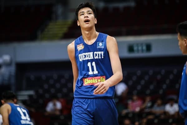 Kai Sotto on the court playing for Quezon City in the Philippines