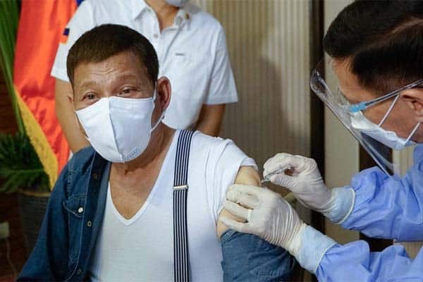 Rodrigo Duterte receives his vaccine